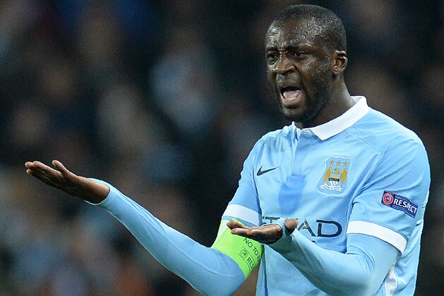 Manchester City's Ivorian midfielder and captain Yaya Toure gestures to Manchester City's English goalkeeper Joe Hart (unseen) as Manchester City's Argentinian defender Nicolas Otamendi (unseen) leaves the pitch injured
during a UEFA Champions League last 16, second leg football match between Manchester City and Dynamo Kiev at the Etihad Stadium in Manchester, north west England, on March 15, 2016. / AFP / OLI SCARFF        (Photo credit should read OLI SCARFF/AFP/Getty Images)