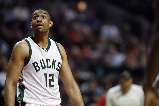 Milwaukee Bucks forward Jabari Parker looks up a score board during the second half of an NBA basketball game against the Chicago Bulls Monday, March 7, 2016, in Chicago. The Bulls won 100-90. (AP Photo/Nam Y. Huh)
