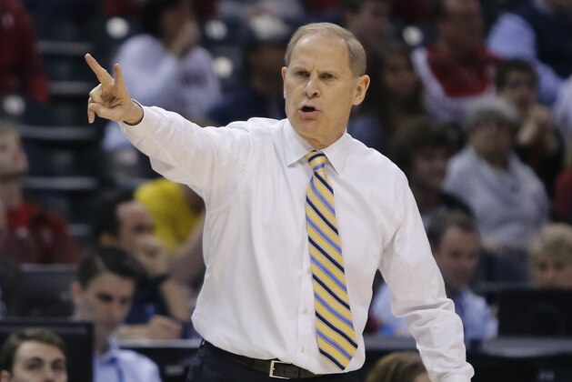 Michigan's head coach John Beilein directs his team in the first half of an NCAA college basketball game against the Indiana in the quarterfinals at the Big Ten Conference tournament, Friday, March 11, 2016, in Indianapolis. (AP Photo/Kiichiro Sato)