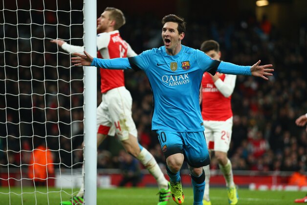 LONDON, ENGLAND - FEBRUARY 23: Lionel Messi of Barcelona celebrates after scoring the opening goal  during the UEFA Champions League round of 16 first leg match between Arsenal and Barcelona on February 23, 2016 in London, United Kingdom.  (Photo by Paul Gilham/Getty Images)