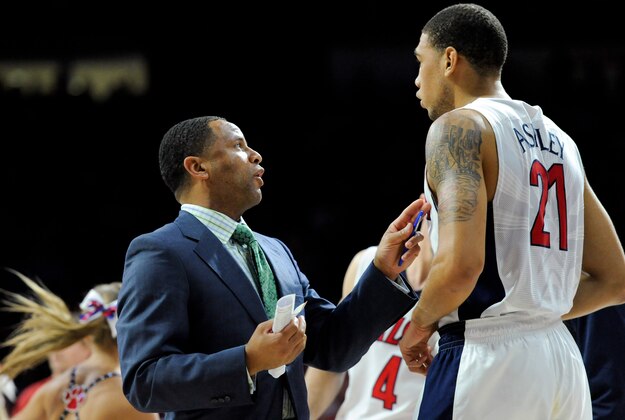 Nov 16, 2014; Tucson, AZ, USA; Arizona Wildcats assistant coach Damon Stoudamire talks to forward Brandon Ashley (21) during the second half against the Cal State Northridge Matadors at McKale Center. Arizona won 86-68. Mandatory Credit: Casey Sapio-USA TODAY Sports