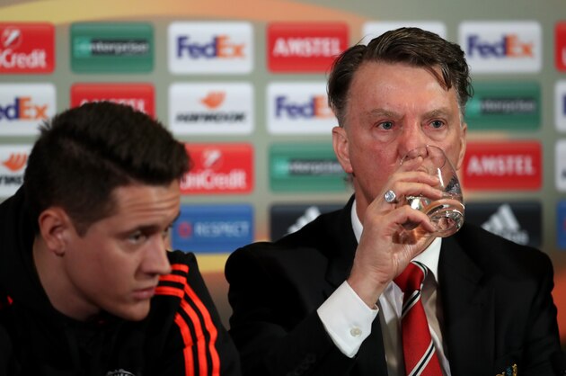 MANCHESTER, ENGLAND - MARCH 16:  Ander Herrera of Manchester United (L) and Louis van Gaal Manager of Manchester United attend a press conference ahead of the UEFA Europa League round of 16 second leg match between Manchester United and Liverpool at Old Trafford on March 16, 2016 in Manchester, England.  (Photo by Steve Bardens/Getty Images)