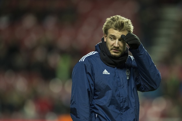 Denmark's forward forward Nicklas Bendtner warms up prior to the friendly international football match between Denmark and the hosts of the Euro 2016 France in Copenhagen on October 11, 2015. AFP PHOTO / ODD ANDERSEN        (Photo credit should read ODD ANDERSEN/AFP/Getty Images)