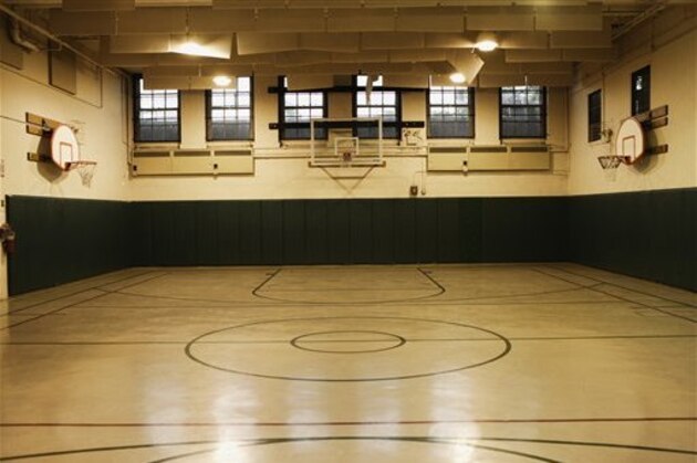Empty basketball court (Blend Images via AP Images)