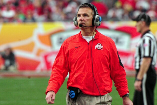 Jan 1, 2016; Glendale, AZ, USA; Ohio State Buckeyes head coach Urban Meyer looks on during the first half against the Notre Dame Fighting Irish in the 2016 Fiesta Bowl at University of Phoenix Stadium. Mandatory Credit: Matt Kartozian-USA TODAY Sports Jan 1, 2016; Glendale, AZ, USA; Ohio State Buckeyes head coach Urban Meyer looks on during the first half against the Notre Dame Fighting Irish in the 2016 Fiesta Bowl at University of Phoenix Stadium. Mandatory Credit: Matt Kartozian-USA TODAY Sports