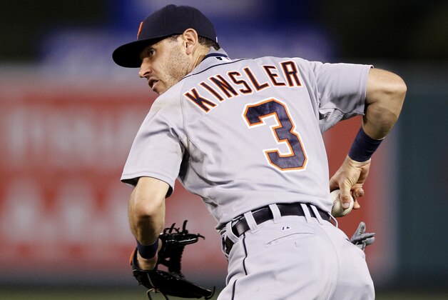 Detroit Tigers second baseman Ian Kinsler (3) throws out Los Angeles Angels’ David Freese during the sixth inning of a baseball game in Anaheim, Calif., Saturday, May 30, 2015. (AP Photo/Alex Gallardo)