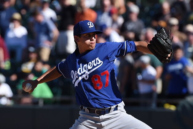 MESA, AZ - MARCH 10:  Jose De Leon #87 of the Los Angeles Dodgers delivers a pitch against the Oakland Athletics at HoHoKam Stadium on March 10, 2016 in Mesa, Arizona.  (Photo by Norm Hall/Getty Images)