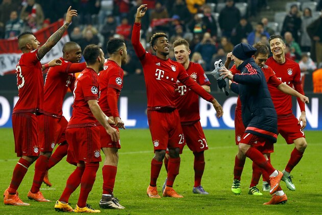 Bayern's players celebrate after the Champions League round of 16 second leg soccer match between FC Bayern Munich and Juventus Turin in Munich, southern Germany, Wednesday, March 16, 2016. Munich defeated Juventus by 4-2. (AP Photo/Matthias Schrader)