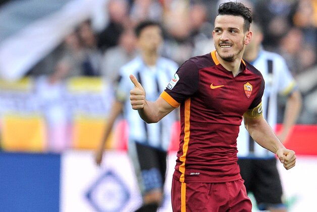 AS Roma's midfielder Alessandro Florenzi celebrates after scoring 2-0 during the Italian Serie A football match between Udinese Calcio and AS Roma on March 13, 2016, at Dacia Arena in Udine.   / AFP / SIMONE FERRARO        (Photo credit should read SIMONE FERRARO/AFP/Getty Images)