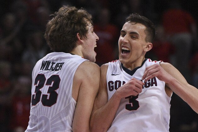 March 7, 2016; Las Vegas, NV, USA; Gonzaga Bulldogs forward Kyle Wiltjer (33) celebrates with guard Kyle Dranginis (3) after the game in the semifinals of the West Coast Conference tournament at Orleans Arena. Mandatory Credit: Kyle Terada-USA TODAY Sports