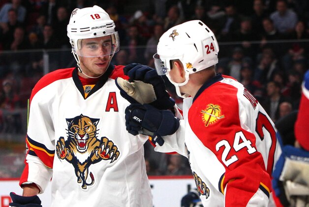 Mar 15, 2016; Montreal, Quebec, CAN; Florida Panthers left wing Jiri Hudler (24) celebrates his goal against Montreal Canadiens with teammate right wing Reilly Smith (18) during the second period at Bell Centre. Mandatory Credit: Jean-Yves Ahern-USA TODAY Sports