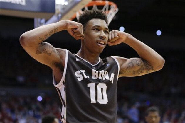 FILE - In this Feb. 20, 2016, file photo, St. Bonaventure's Jaylen Adams (10) reacts after scoring during the second half of an NCAA college basketball game against Dayton, in Dayton, Ohio. St. Bonaventure is the third seed entering the A-10 tournament, which it will open on Friday in the quarterfinal round against an opponent not yet determined.  (AP Photo/John Minchillo, File)
