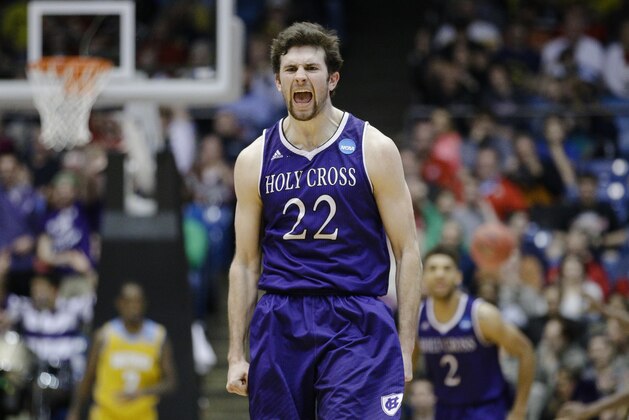 Holy Cross' Robert Champion reacts after hitting a 3-pointer during the second half of a First Four game of the NCAA college basketball tournament against Southern University, Wednesday, March 16, 2016, in Dayton, Ohio. Holy Cross won 59-55. (AP Photo/John Minchillo)