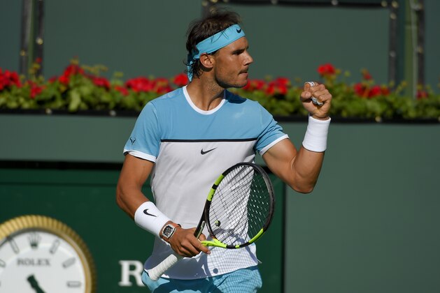 Rafael Nadal, of Spain, reacts while playing Alexander Zverev, of Germany, during the BNP Paribas Open tennis tournament, Wednesday, March 16, 2016, in Indian Wells, Calif. (AP Photo/Mark J. Terrill)