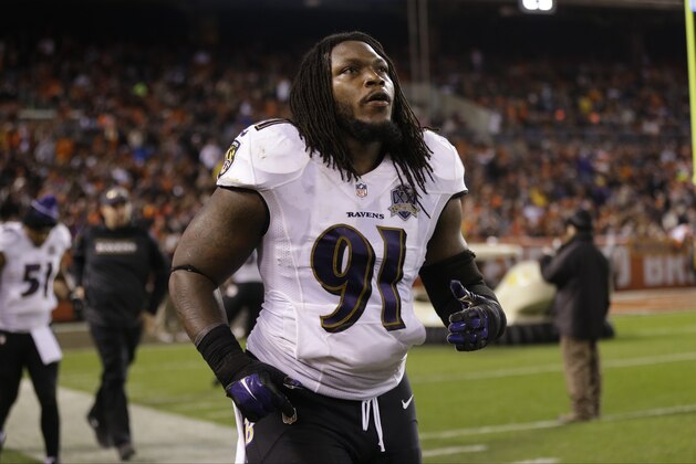 Baltimore Ravens outside linebacker Courtney Upshaw walks on the field prior to an NFL football game against the Cleveland Browns Monday, Nov. 30, 2015, in Cleveland. Baltimore won 33-27. (AP Photo/David Richard)