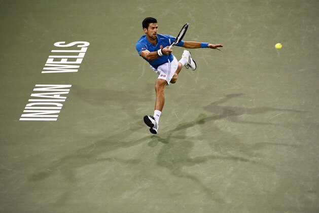 Novak Djokovic, of Serbia, returns a shot to Philipp Kohlschreiber, of Germany, at the BNP Paribas Open tennis tournament, Tuesday, March 15, 2016, in Indian Wells, Calif. (AP Photo/Mark J. Terrill)
