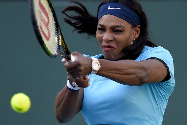 Serena Williams returns to Kateryna Bondarenko, of the Ukraine, during the BNP Paribas Open tennis tournament, Tuesday, March 15, 2016, in Indian Wells, Calif. (AP Photo/Mark J. Terrill)