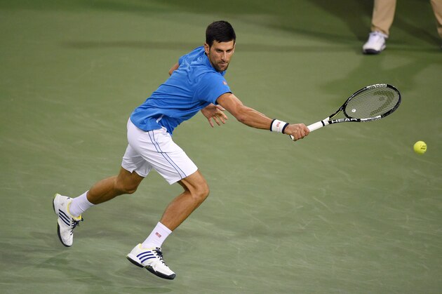 Novak Djokovic, of Serbia, returns a shot from Feliciano Lopez, of Spain, at the BNP Paribas Open tennis tournament, Wednesday, March 16, 2016, in Indian Wells, Calif. Djokovic won 6-3, 6-3. (AP Photo/Mark J. Terrill)