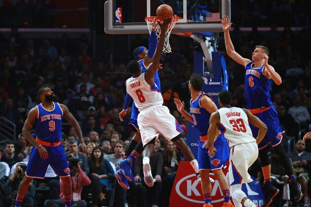 LOS ANGELES, CA - MARCH 11: Jeff Green #8 of the Los Angeles Clippers jumps to the basket against Carmelo Anthony #7 of the New York Knicks during the second half of the NBA game at Staples Center on March 11, 2016 in Los Angeles, California. NOTE TO USER: User expressly acknowledges and agrees that, by downloading and or using this photograph, User is consenting to the terms and conditions of the Getty Images License Agreement.  (Photo by Victor Decolongon/Getty Images)