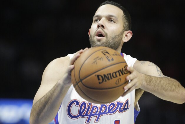 Los Angeles Clippers' Jordan Farmar during the first half of an NBA basketball game against the Orlando Magic Wednesday, Dec. 3, 2014, in Los Angeles. (AP Photo/Jae C. Hong)