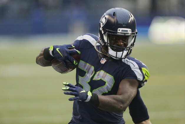 Seattle Seahawks' Christine Michael in action against the St. Louis Rams in the second half of an NFL football game, Sunday, Dec. 27, 2015, in Seattle. (AP Photo/Stephen Brashear)