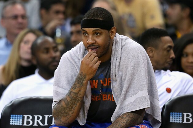 OAKLAND, CA - MARCH 16:  Carmelo Anthony #7 of the New York Knicks sits on the bench during their game against the Golden State Warriors at ORACLE Arena on March 16, 2016 in Oakland, California. NOTE TO USER: User expressly acknowledges and agrees that, by downloading and or using this photograph, User is consenting to the terms and conditions of the Getty Images License Agreement.  (Photo by Ezra Shaw/Getty Images)
