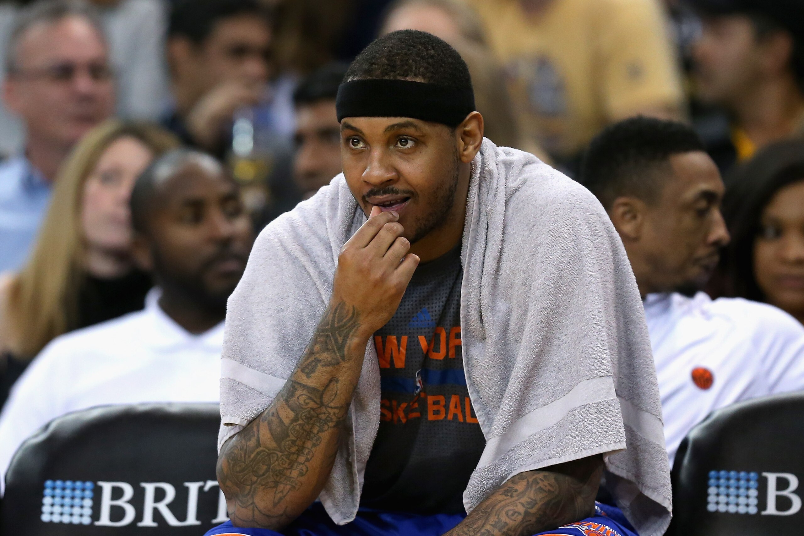 OAKLAND, CA - MARCH 16:  Carmelo Anthony #7 of the New York Knicks sits on the bench during their game against the Golden State Warriors at ORACLE Arena on March 16, 2016 in Oakland, California. NOTE TO USER: User expressly acknowledges and agrees that, by downloading and or using this photograph, User is consenting to the terms and conditions of the Getty Images License Agreement.  (Photo by Ezra Shaw/Getty Images)