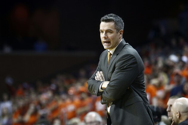 Virginia head coach Tony Bennett calls to his team during the first half of an NCAA college basketball game in Charlottesville, Va., on Monday, Feb. 15, 2016. (AP Photo/Ryan M. Kelly)