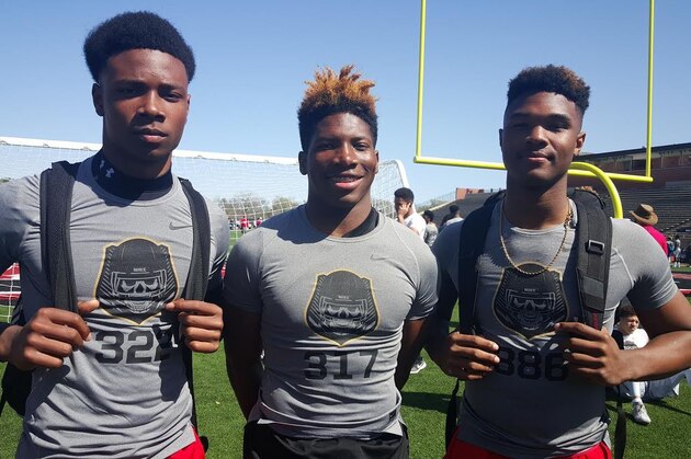The Cedar Hill, Texas, wide receiver trio (from left) of Charleston Rambo, Jaylon Jackson and Camron Buckley have more than 50 scholarship offers collectively, and all three are reliable options in Cedar Hill's explosive offense.