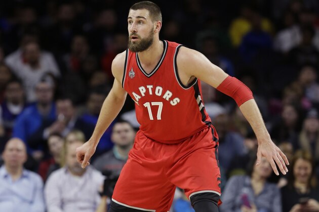 Toronto Raptors center Jonas Valanciunas defends the basket during the first half of an NBA basketball game against the Detroit Pistons, Monday, Feb. 8, 2016 in Auburn Hills, Mich. (AP Photo/Carlos Osorio)
