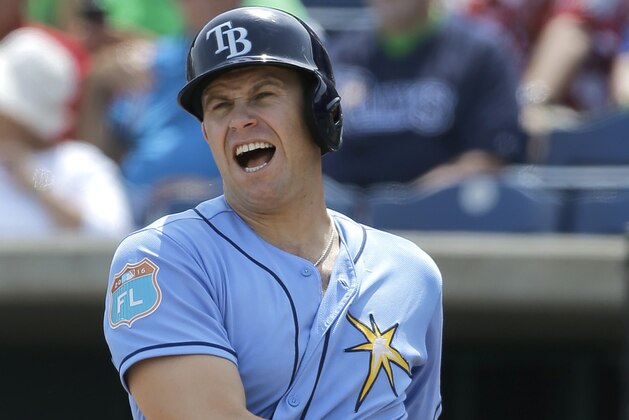 Tampa Bay Rays' Evan Longoria reacts as he fouls a pitch from Philadelphia Phillies' Vince Velasquez off his foot during the first inning of a spring training baseball game Thursday, March 17, 2016, in Clearwater, Fla. (AP Photo/Chris O'Meara)