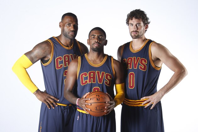 INDEPENDENCE, OH - SEPTEMBER 28: Kevin Love #0, Kyrie Irving #2 and LeBron James #23 of the Cleveland Cavaliers pose for a photo during media day on September 28, 2015 at the Cleveland Clinic Courts in Independence, Ohio.  NOTE TO USER: User expressly acknowledges and agrees that, by downloading and or using this photograph, User is consenting to the terms and conditions of the Getty Images License Agreement. Mandatory Copyright Notice: Copyright 2015 NBAE  (Photo by Gregory Shamus/NBAE via Getty Images)