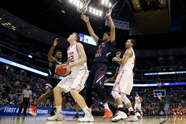 DENVER, CO - MARCH 17:  Jakob Poeltl #42 of the Utah Utes rebounds against the Fresno State Bulldogs in the first half during the first round of the 2016 NCAA Men's Basketball Tournament at Pepsi Center on March 17, 2016 in Denver, Colorado.  (Photo by Sean M. Haffey/Getty Images)