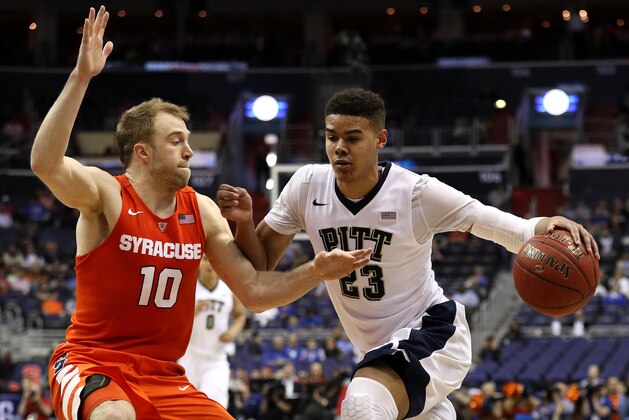 WASHINGTON, DC - MARCH 09: Cameron Johnson #23 of the Pittsburgh Panthers dribbles in front of Trevor Cooney #10 of the Syracuse Orange during the second half in the second round of the 2016 ACC Basketball Tournament at Verizon Center on March 9, 2016 in Washington, DC. Pittsburgh Panthers won, 72-71. (Photo by Patrick Smith/Getty Images)