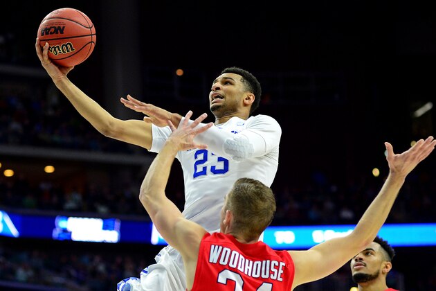 Mar 17, 2016; Des Moines, IA, USA; Kentucky Wildcats guard Jamal Murray (23) shoots the ball against Stony Brook Seawolves guard Lucas Woodhouse (34) during the first half in the first round of the 2016 NCAA Tournament at Wells Fargo Arena. Mandatory Credit: Jeffrey Becker-USA TODAY Sports