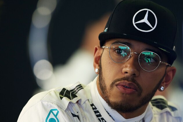 MELBOURNE, AUSTRALIA - MARCH 18: Lewis Hamilton of Great Britain and Mercedes GP in the garage during practice ahead of the Australian Formula One Grand Prix at Albert Park on March 18, 2016 in Melbourne, Australia.  (Photo by Lars Baron/Getty Images)