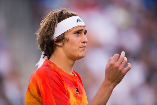 Alexander Zverev of Germany talks to the referee during his match against Rafael Nadal of Spain,  March 16, 2016 at the BNP Paribas Open at the Indian Wells Tennis Garden in Indian Wells, California.  
Nadal defeated the 18-year-old German 6-7(8), 6-0, 7-5. / AFP / ROBYN BECK        (Photo credit should read ROBYN BECK/AFP/Getty Images)