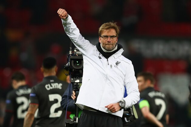MANCHESTER, ENGLAND - MARCH 17:  Jurgen Klopp, manager of Liverpool celebrates a 3-1 aggregate victory after the UEFA Europa League round of 16 second leg match between Manchester United and Liverpool at Old Trafford on March 17, 2016 in Manchester, England.  (Photo by Clive Brunskill/Getty Images)