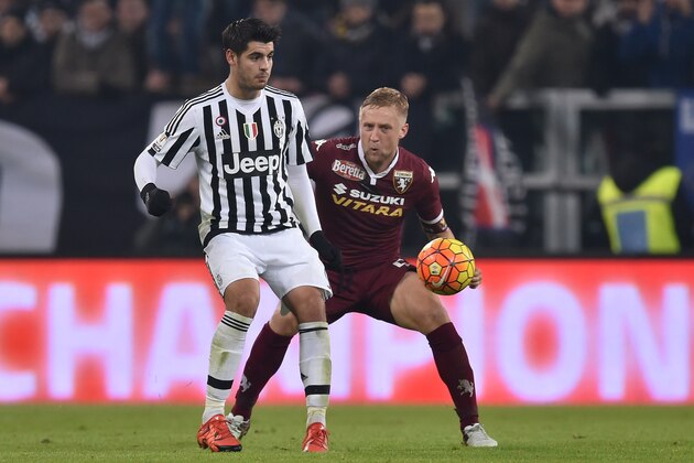TURIN, ITALY - DECEMBER 16:  Alvaro Morata (L) of FC Juventus is challenged by Kamil Glik of Torino FC during the TIM Cup match between FC Juventus and Torino FC at Juventus Arena on December 16, 2015 in Turin, Italy.  (Photo by Valerio Pennicino/Getty Images)