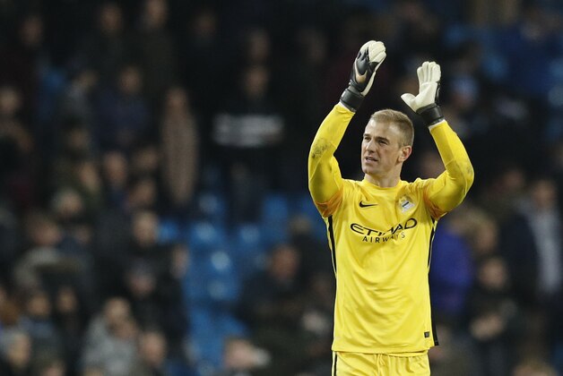 Manchester City's goalkeeper Joe Hart waves to the crowd after the end of the Champions League round of 16 second leg soccer match between Manchester City and Dynamo Kiev at the Etihad Stadium, Manchester, England, Tuesday, March. 15, 2016. (AP Photo/Jon Super)