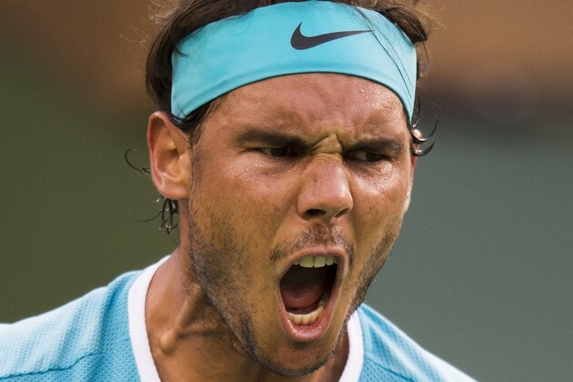 Rafael Nadal of Spain reacts after winning a point against Alexander Zverev of Germany,  March 16, 2016 at the BNP Paribas Open at the Indian Wells Tennis Garden in Indian Wells, California.  
Nadal defeated the 18-year-old German 6-7(8), 6-0, 7-5. / AFP / ROBYN BECK        (Photo credit should read ROBYN BECK/AFP/Getty Images)