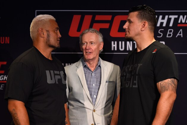 BRISBANE, AUSTRALIA - MARCH 18:   (L-R) Opponents Mark Hunt of New Zealand and Frank Mir face off during the UFC Ultimate Media Day at the Brisbane Marriott Hotel on March 18, 2016 in Brisbane, Australia. (Photo by Josh Hedges/Zuffa LLC/Zuffa LLC via Getty Images)