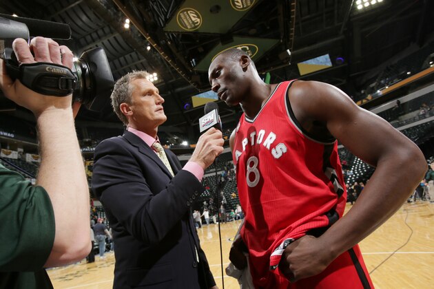 INDIANAPOLIS, IN - MARCH 17:  Bismack Biyombo #8 of the Toronto Raptors is interviewed after the game against the Indiana Pacers on March 17, 2016 at Bankers Life Fieldhouse in Indianapolis, Indiana. NOTE TO USER: User expressly acknowledges and agrees that, by downloading and or using this Photograph, user is consenting to the terms and conditions of the Getty Images License Agreement. Mandatory Copyright Notice: Copyright 2016 NBAE (Photo by Ron Hoskins/NBAE via Getty Images)