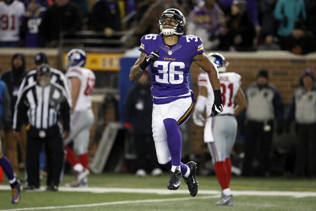 Minnesota Vikings strong safety Robert Blanton (36) celebrates after his runback of a New York Giants onside kick attempt during the second half of an NFL football game, Sunday, Dec. 27, 2015, in Minneapolis. (AP Photo/Ann Heisenfelt)