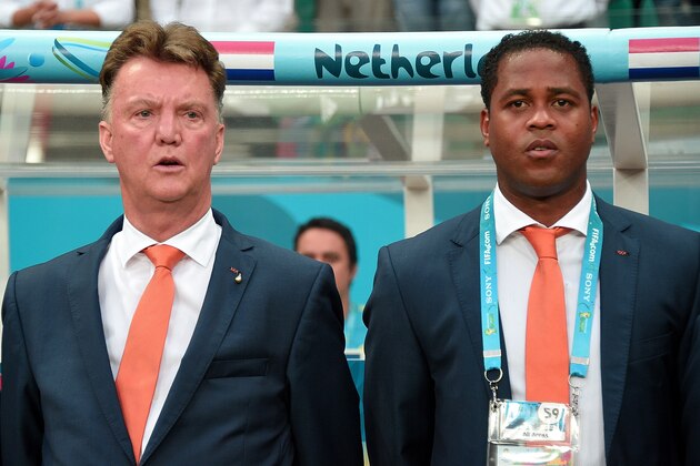 Netherlands' coach Louis van Gaal (L) and assistant coach Patrick Kluivert (R) attend the a quarter-final football match between Netherlands and Costa Rica at the Fonte Nova Arena in Salvador during the 2014 FIFA World Cup on July 5, 2014.   AFP PHOTO / DAMIEN MEYER        (Photo credit should read DAMIEN MEYER/AFP/Getty Images)