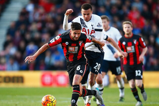 BOURNEMOUTH, ENGLAND - OCTOBER 25: Andrew Surman of Bournemouth and Dele Alli of Tottenham Hotspur compete for the ball during the Barclays Premier League match between A.F.C. Bournemouth and Tottenham Hotspur at Vitality Stadium on October 25, 2015 in Bournemouth, England.  (Photo by Jordan Mansfield/Getty Images)
