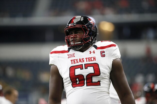 Texas Tech offensive lineman Le'Raven Clark warms up on the field before an NCAA college football game against Baylor Saturday, Oct. 3, 2015, in Arlington, Texas. (AP Photo/Tony Gutierrez)
