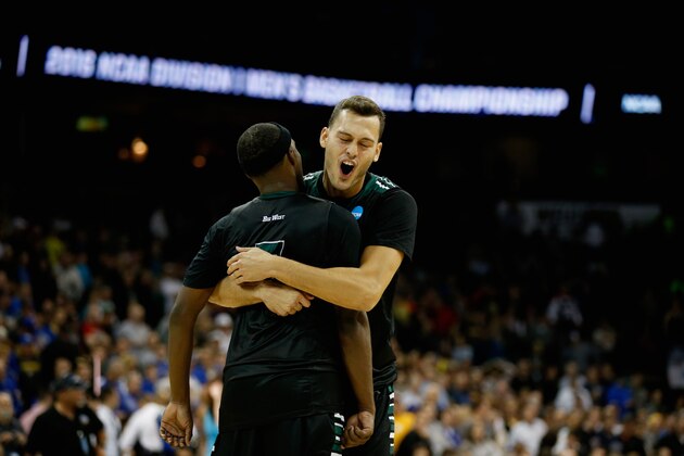SPOKANE, WA - MARCH 18: Stefan Jovanovic #15 of the Hawaii Warriors and Roderick Bobbitt #5 celebrate following their 77-66 win over the California Golden Bears during the first round of the 2016 NCAA Men's Basketball Tournament at Spokane Veterans Memorial Arena on March 18, 2016 in Spokane, Washington.  (Photo by Ezra Shaw/Getty Images)