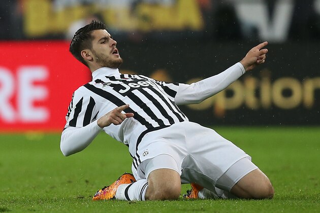 Juventus' Spanish forward Alvaro Morata celebrates after scoring during the Italian Serie A  football match Juventus Vs Inter Milan on February 28, 2016 at the 'Juventus Stadium' in Turin.    / AFP / MARCO BERTORELLO        (Photo credit should read MARCO BERTORELLO/AFP/Getty Images)