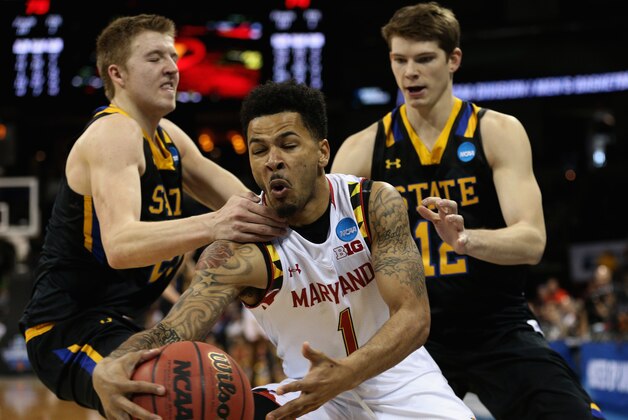 SPOKANE, WA - MARCH 18: Reed Tellinghuisen #23 of the South Dakota State Jackrabbits fouls Jaylen Brantley #1 of the Maryland Terrapins as Keaton Moffitt #12 of the South Dakota State Jackrabbits looks on in the second half during the first round of the 2016 NCAA Men's Basketball Tournament at Spokane Veterans Memorial Arena on March 18, 2016 in Spokane, Washington.  (Photo by Patrick Smith/Getty Images)